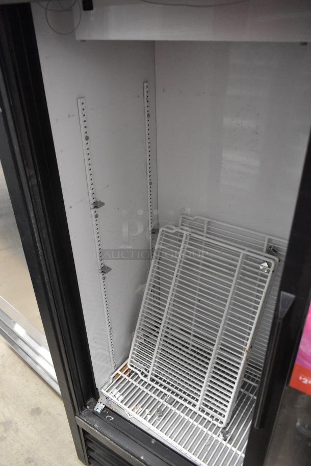 True GDM-41SL-60-LD 2-door reach-in cooler, poly-coated racks, 115V, metal construction, commercial use, interior view.