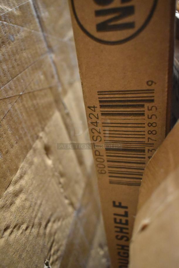 Label showing "600PTS2424" on a cardboard box, indicating a Regency 16-Gauge Type 304 Stainless Steel Pass-Through Shelf, 24"x24".