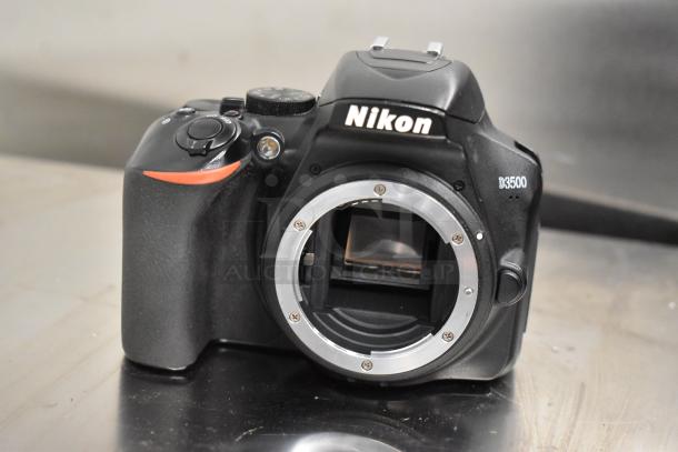 Nikon D3500 digital camera body, no lens, in good condition, featuring model marking and mount details.