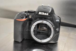 Nikon D3500 digital camera body, no lens, in good condition, featuring model marking and mount details.