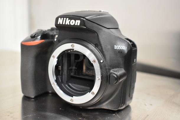 Nikon D3500 digital camera body, shows lens mount. Excellent condition, no lens included. Visible Nikon and D3500 labels.