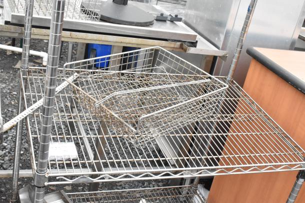 Chrome finish 2-tier wire shelving unit, industrial style, sturdy condition. Buyer must dismantle. Consider freight charges.