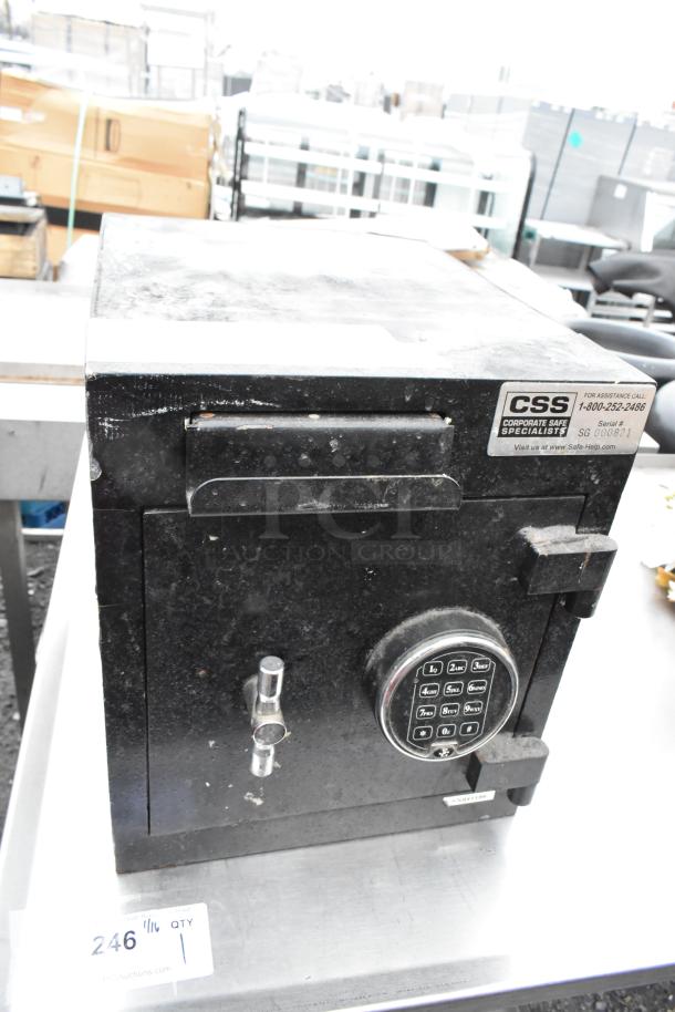 Corporate Safe Specialists black metal single compartment safe, no combination, keypad entry, visible wear, labeled CSS.