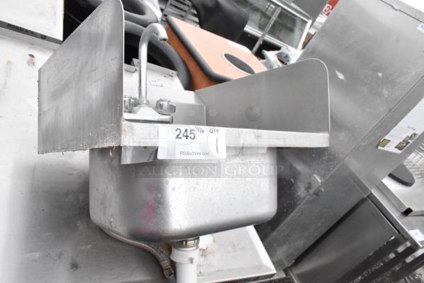 Stainless steel commercial single bay sink with faucet and handles, used condition, visible auction tag 245, PCI Auctions.