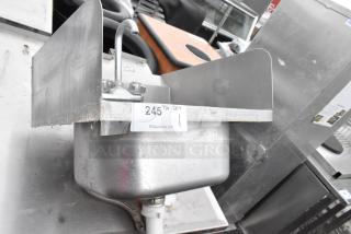 Stainless steel commercial single bay sink with faucet and handles, used condition, visible auction tag 245, PCI Auctions.