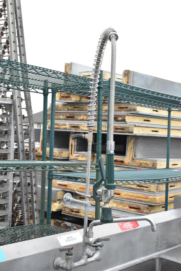 Stainless Steel 3 Bay Sink with dual drain boards, shown with faucet and hose. Labels indicate basins and sanitizer use.