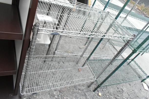 Chrome finish 2-tier wire shelving unit, sturdy metal construction, buyer to dismantle, freight charges apply.