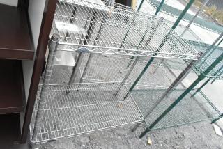 Chrome finish 2-tier wire shelving unit, sturdy metal construction, buyer to dismantle, freight charges apply.