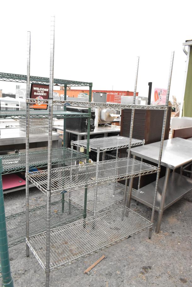 Chrome finish 3-tier wire shelving unit in good condition. Buyer must dismantle. Consider freight charges.