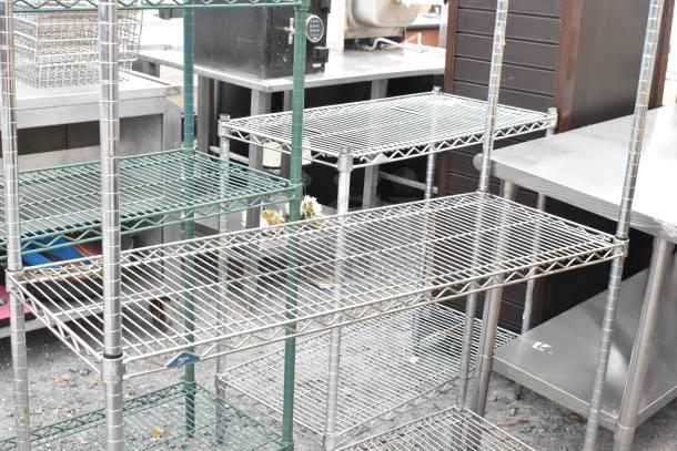 Chrome finish 3-tier wire shelving unit, excellent condition. Requires buyer to dismantle. Consider freight charges.