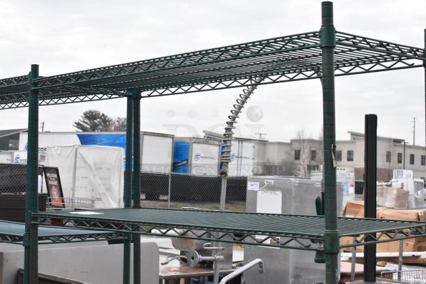 Green 4-tier wire shelving unit, sturdy metal construction. Buyer must dismantle. Consider freight charges.