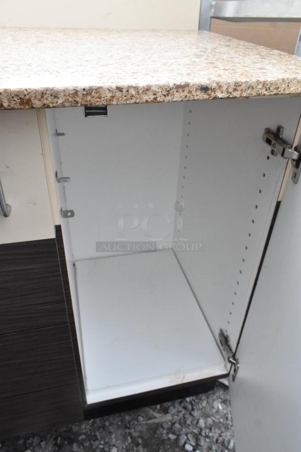 Trash can shell with trash deposit hole, two doors, wood finish, and granite-like countertop. Clean interior, no visible damage.