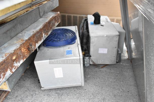 Norlake walk-in box components; two evaporator fans visible. Condition shows rust. Labels present but unreadable.