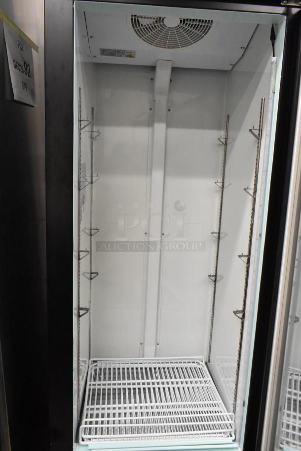 Avantco 178GDC12FHCB 27" black merchandiser freezer, swing glass door, LED lighting, poly-coated racks, brand new condition.