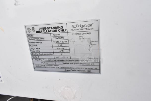 EdgeStar CMF151L label showing 115V, R134a refrigerant, and 2014 manufacture date. Made in China.