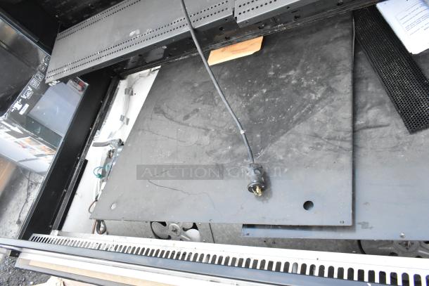 Killion PFW-74-43-48-V-N-MOBILE metal merchandiser, open interior, visible power plug, 208/230V, 1 phase.