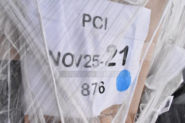 Package labeled "PCI NOV25-21 876" wrapped in plastic, contains 5 new scratch and dent items, including Lancaster Tabletop.