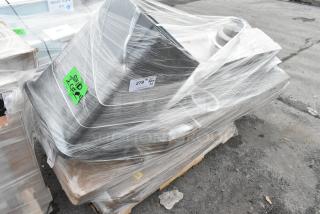 Pallet of 8 new scratch and dent items wrapped in plastic, including a grease trap, drying rack, work table, and trash can. Labels show item codes.