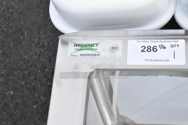 New Regency 600SM202812 stainless steel mop sink, 33", 16-gauge, with visible label showing model number and NSF mark.