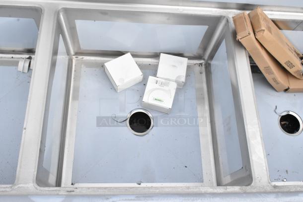 Brand new Regency 600S32323 stainless steel three-compartment sink, 78", 16-gauge, with legs and cross bracing, no drainboards.