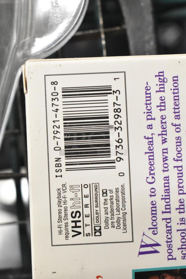 Close-up of VHS spine showing barcode, ISBN 0-7921-4730-8, VHS hi-fi stereo, Dolby Surround encoding, and partial text.