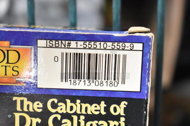 18 various VHS tapes, including titles like "Jeffrey" and "Three Men and a Baby." Includes ISBN: 1-55510-559-9.