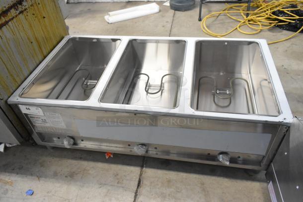 Brand new 2025 ServIt 423EST3WO stainless steel electric steam table, three pan open well, adjustable undershelf, 120V, 1 phase.