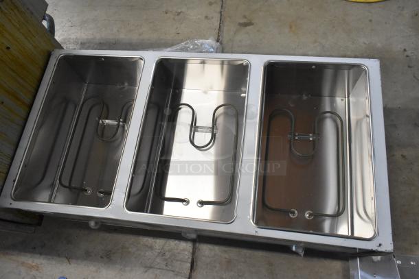 Brand new ServIt 423EST3WO three pan stainless steel steam table, 120V, 1 phase, slight cosmetic dents, tested and working.