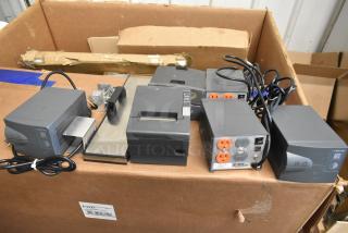 10-item lot with Epson receipt printer, 2 QSR kitchen controllers, Powervar power conditioners, and various cables in a cardboard box.