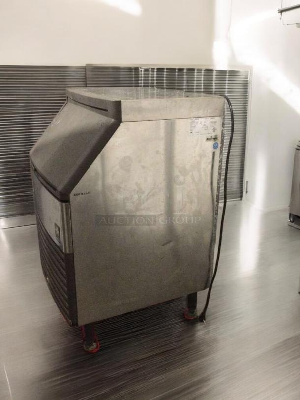Pristine Manitowoc QY0214A commercial ice maker, 115V, single phase, fully tested, excellent condition, model tag visible.