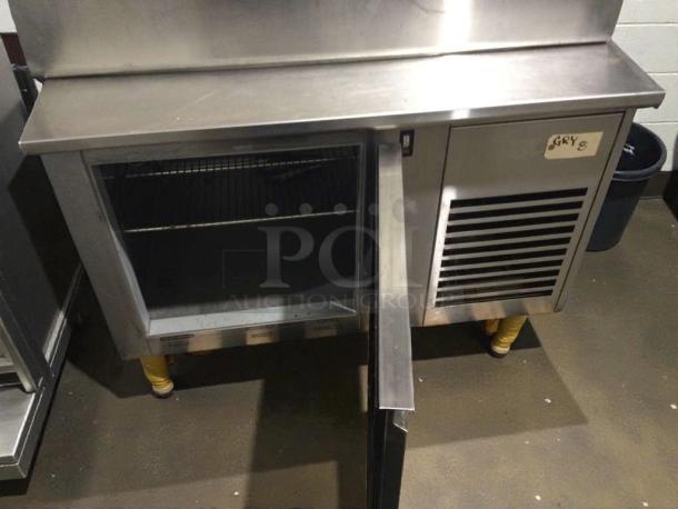 ICM Stainless SCSLC-1800 commercial undercounter unit, immaculate condition, 120/220V, open door showing shelving, label marked "GRY 6".