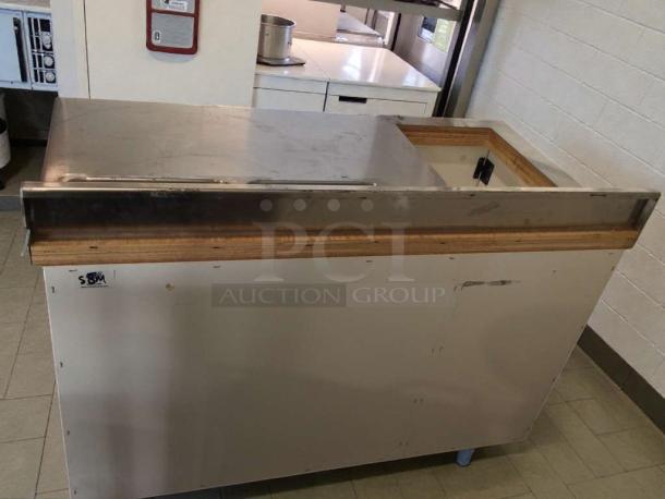 Custom stainless steel counter cabinet with dual sink and trash cutout, immaculate condition, inspected and commercial grade.
