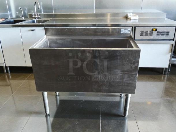 High-grade Krowne 18-36-7 stainless steel ice bin, NSF-certified, fully inspected, excellent condition, ready for use.