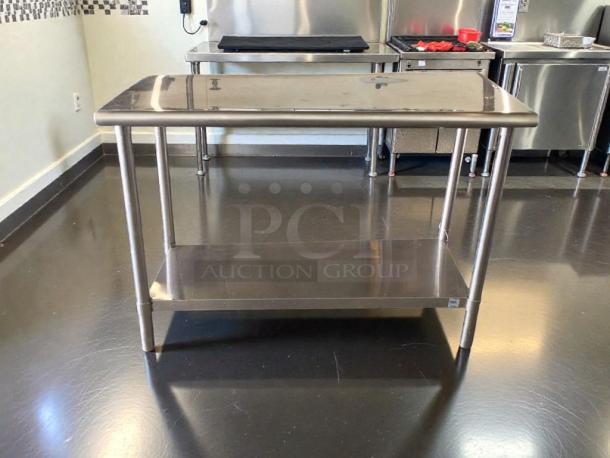 Stainless steel ice bin with undershelf. Custom fabricated, premium condition, NSF style. Fully inspected, ready for use.