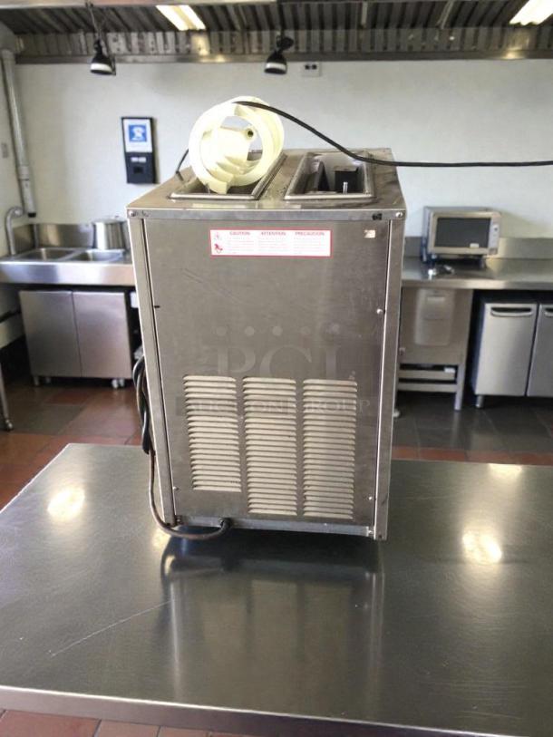 Grindmaster 3332 dual bowl slush machine in outstanding condition, stainless steel, fully tested, shows caution label.