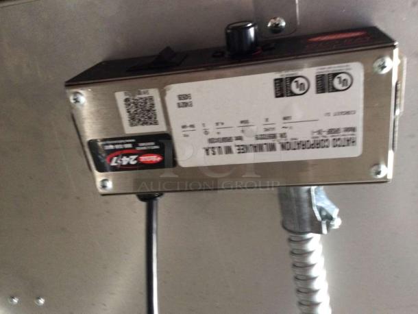 Commercial Induction Cooktop Table, stainless steel, model IND-L-TBL-0255, top-tier condition, fully tested, with visible labels.