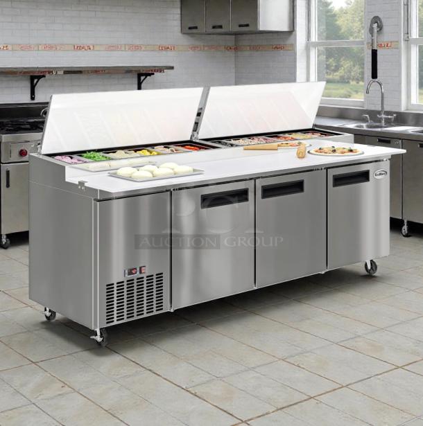 Brand new KoolMore 92" three-door pizza prep refrigerator, model KM-RPPS-3DSS, with slight scratch and dent. Features stainless steel body, top storage for ingredients, and spacious interior.