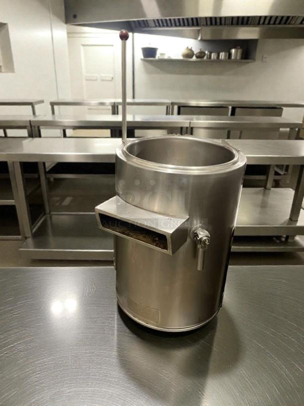 Premium condition stainless steel commercial steam-jacketed kettle with agitator in a professional kitchen. Fully tested.
