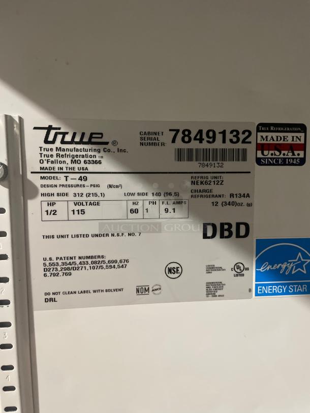 True T-49 commercial refrigerator label, showing model details, Made in USA badge, and Energy Star certification.