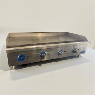 Pristine Globe commercial gas griddle, stainless steel, model GLO-L-GRD-0095. Fully tested, excellent condition.