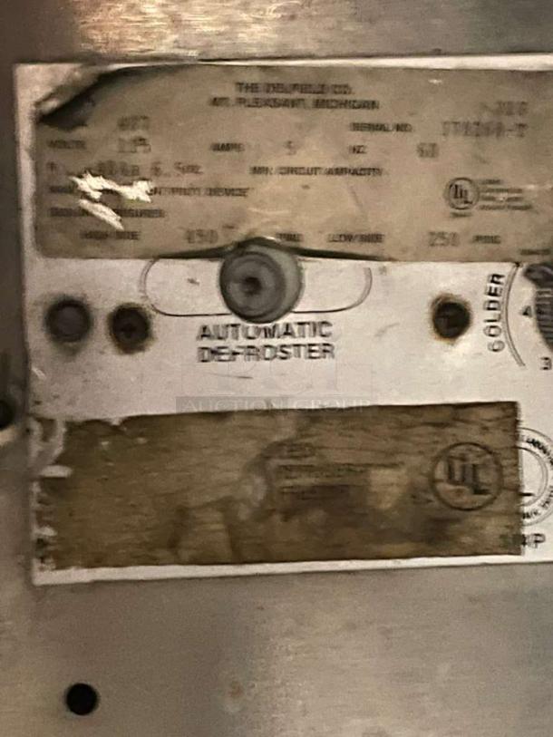 Immaculate Delfield undercounter refrigerator label showing model details, 115V, single phase, made in Mt. Pleasant, Michigan.