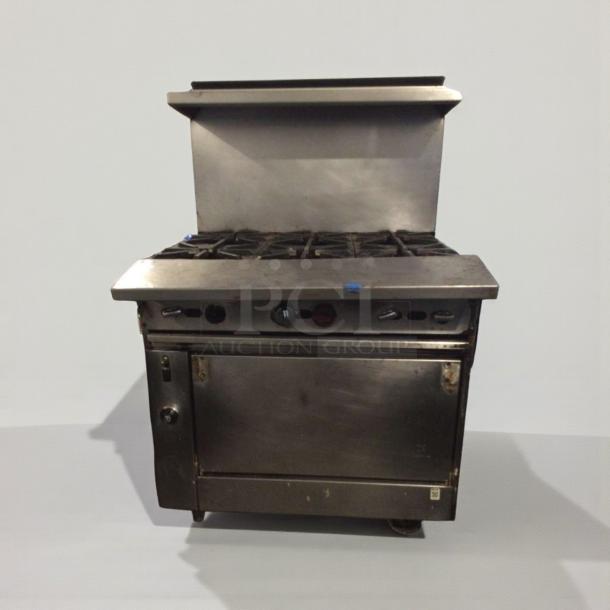 Commercial-grade 6-burner gas range with oven, stainless steel, model GEN-L-RNG-0277, premium condition, fully tested.