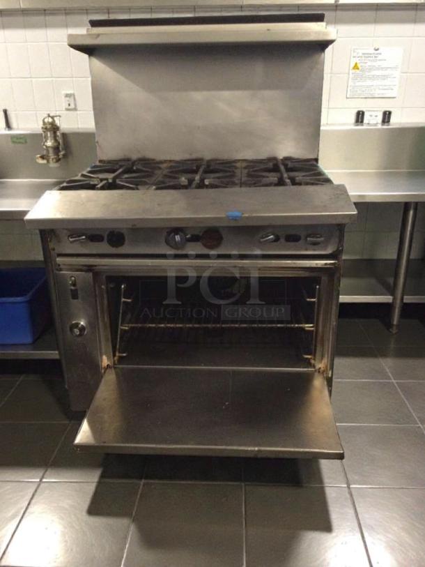 Commercial 6-burner gas range with oven, stainless steel, model GEN-L-RNG-0277, fully tested, premium condition.