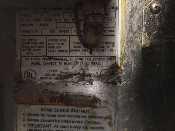 BKI Commercial Pressure Fryer label detailing electrical and safety instructions, indicating a fully tested and working unit.