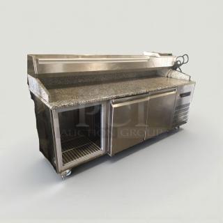 Commercial pizza prep refrigerator, granite top, multi-door, excellent condition, 115V, fully tested. Model GEN-L-PREP-0280.