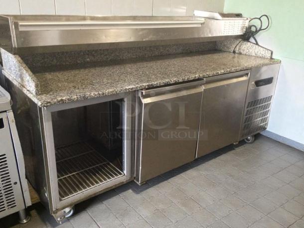 Commercial pizza prep refrigerator with granite top, multi-door, 115V; excellent condition, fully tested and working.