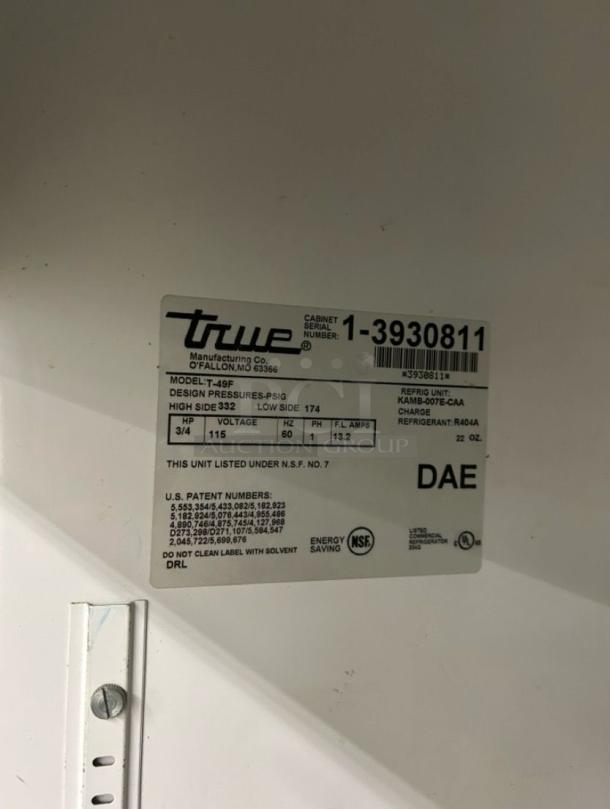 True T-49F commercial freezer label showing model, serial number, and specifications, in excellent condition.