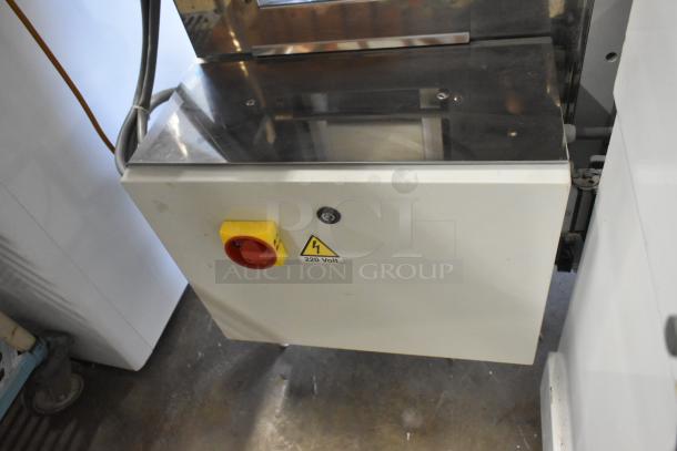 Arcobaleno AMF160 commercial pasta machine on wheels, metal body, 220/380V, 3 phase, power switch and voltage label visible.