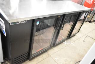 Brand new 2025 True TBB-4G-HC-LD 3-door bar cooler, metal finish, 115V, 1 phase, visible scratch, True logo, labeled for merchandising.