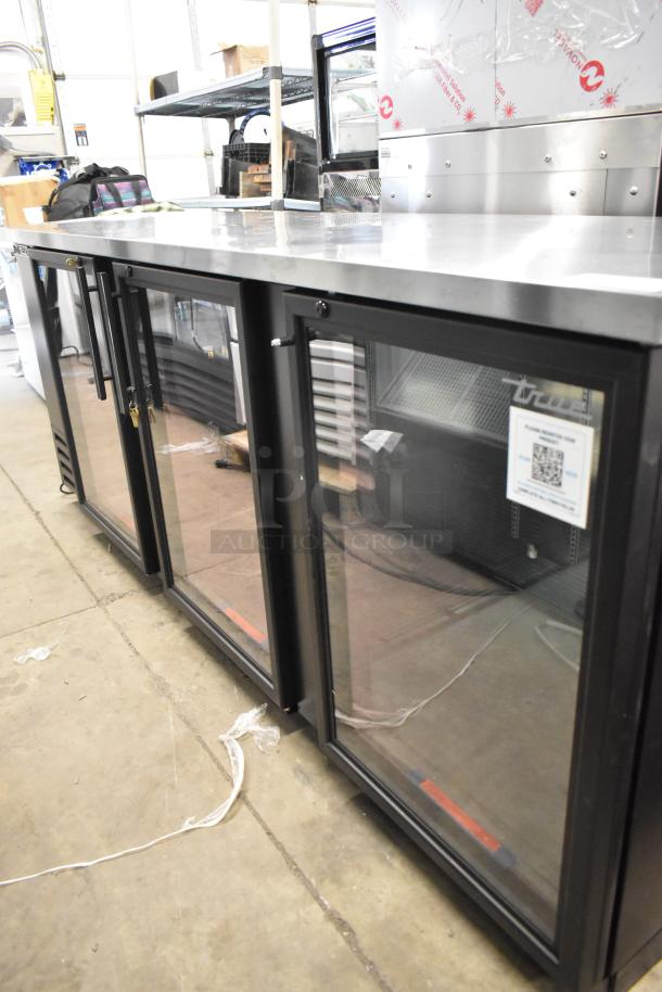 BRAND NEW 2025 True TBB-4G-HC-LD 3 Door Back Bar Cooler. Minor scratches, metal finish, glass doors, 115V, 1 phase.